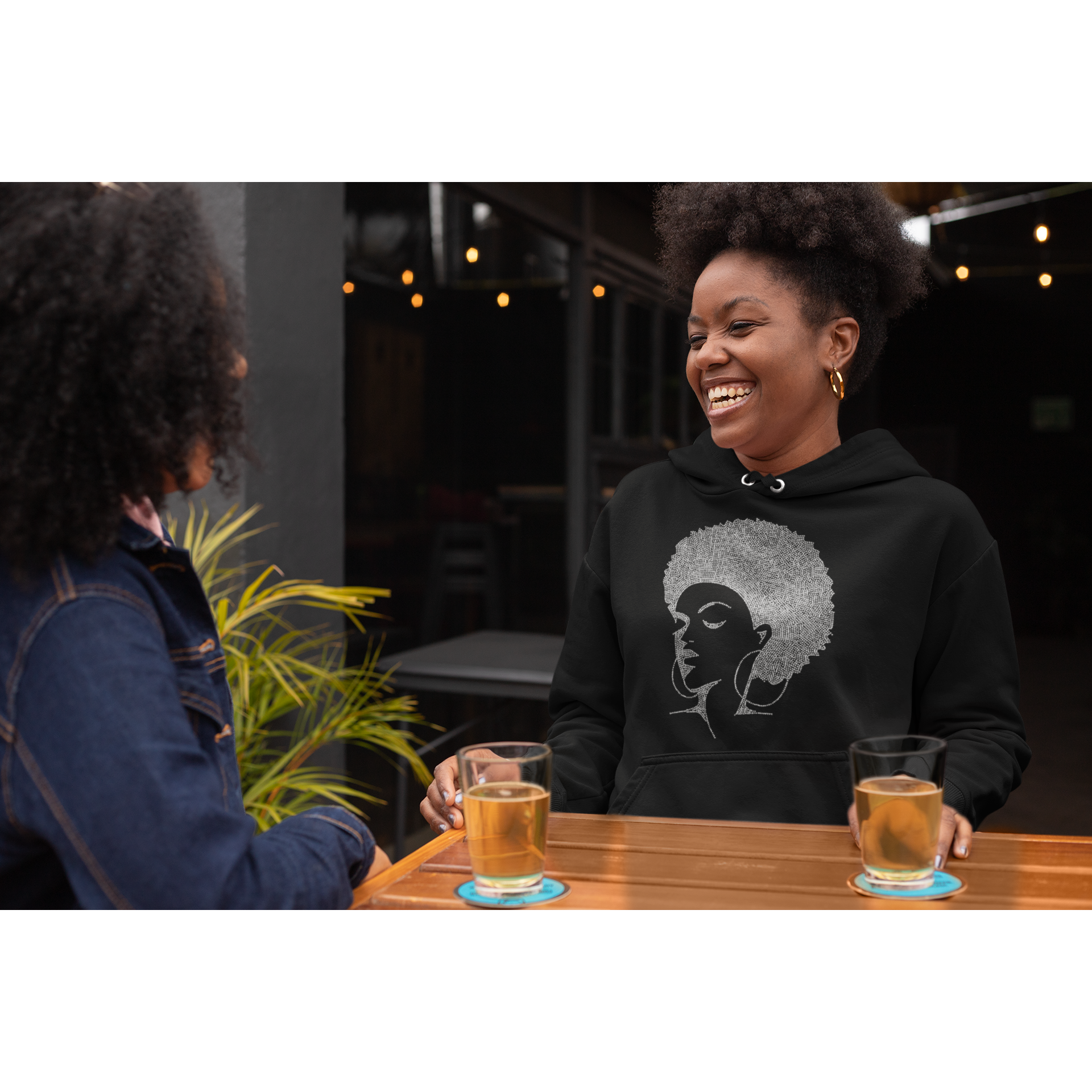 afro lady rhinestone shirt in bar